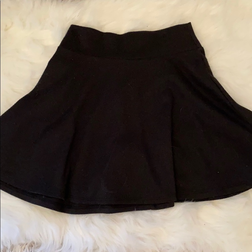 Black full tilt mini skirt.